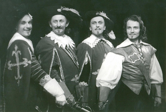 V roce 1953 hrál Burian v karlínském divadle Porthose v Nezvalově veršované úpravě Dumasových Třech mušketýrů.