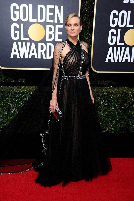 Diane Kruger zvolila šaty z módního domu Prada, které upozorňovaly na detaily, zejména pak na drobné stříbrné ozdůbky.