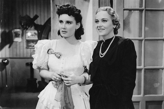 Zita Kabátová (vpravo) s Lídou Baarovou ve filmu Artur a Leontýna (1940)