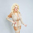 Silikonové vycpávky a silná vrstva make-upu: Podívejte se, jak dala hvězdě Tváře zabrat proměna v Dolly Parton