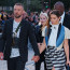 Justina Timberlakea a jeho ženu vyděsil senzacechtivý Ukrajinec. Cestou na přehlídku se zpěvákovi pověsil na nohu